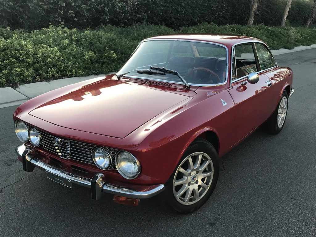 A red 1974 Alfa Romeo 2000 GTV coupe