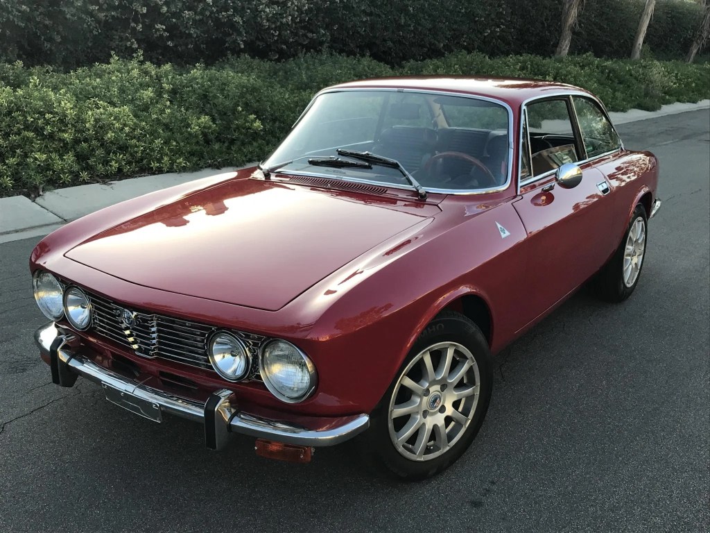 A red 1974 Alfa Romeo 2000 GTV coupe