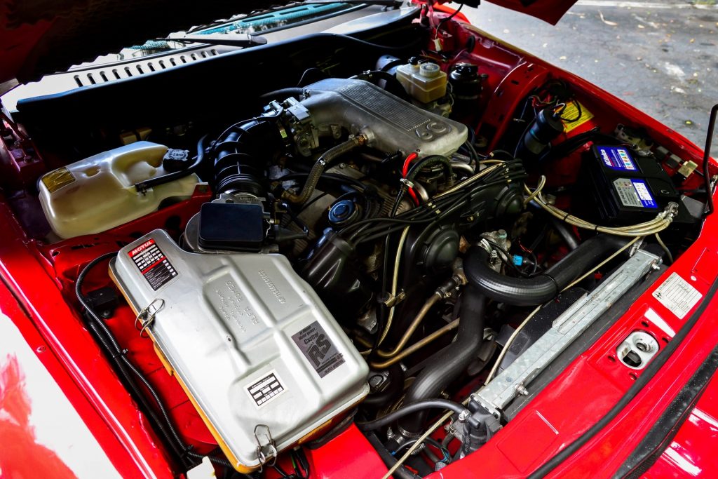 The engine bay of the 1990 Alfa Romeo SZ