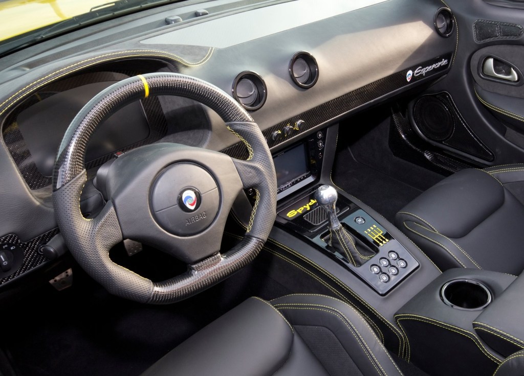 The black-with-yellow-stitching interior of the 2015 Panoz Esperante Spyder GT