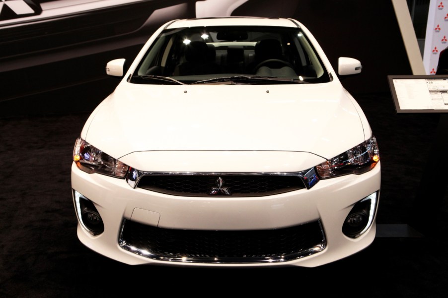 A 2017 Mitsubishi Lancer on display at an auto show