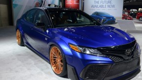 A 2017 Camry SXE sits on display at the Los Angeles Auto Show in the Los Angeles Convention Center