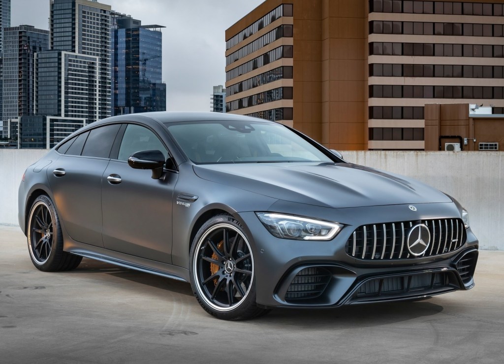 A matte-gray 2019 Mercedes-AMG GT63 S parked on the top level of a city parking garage