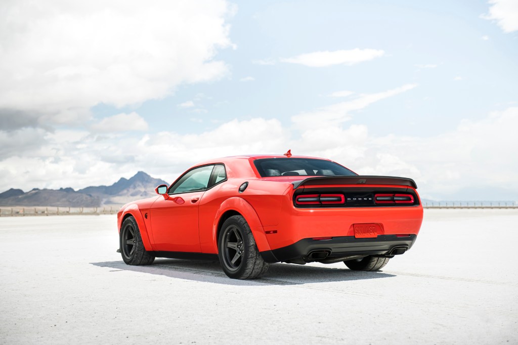 The rear of the red 2020 Dodge Challenger SRT Super Stock on a dry desert lakebed