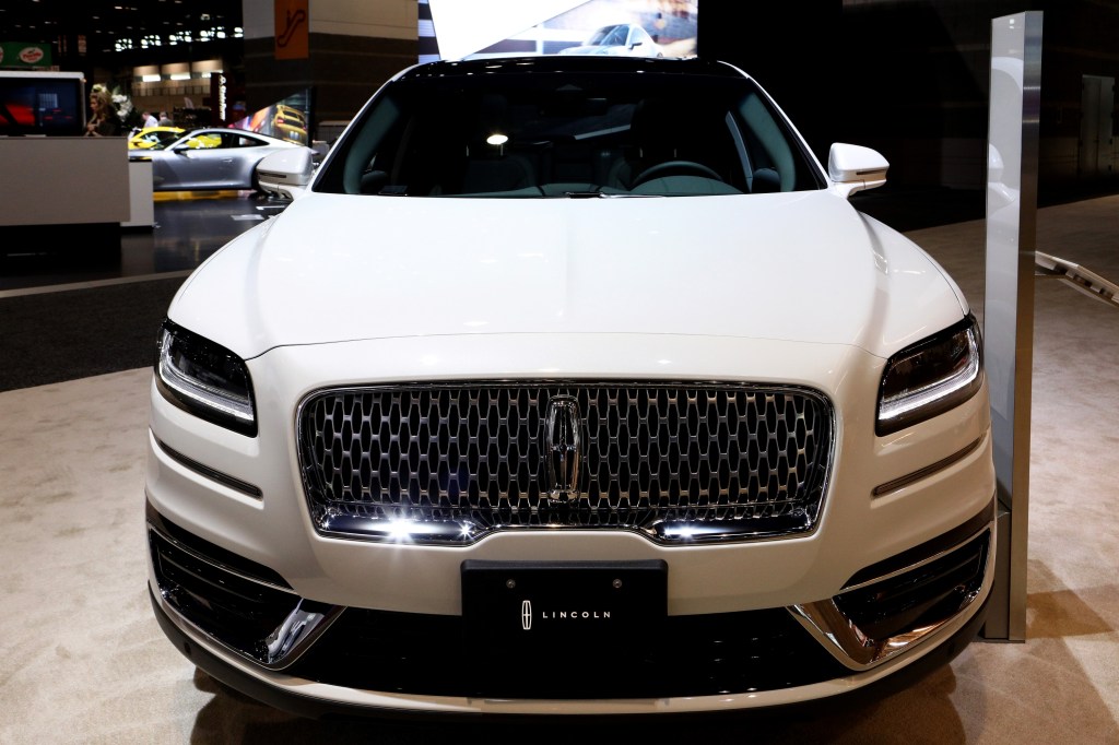 The front of a white 2020 Lincoln Nautilus SUV