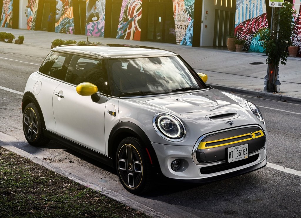 A white 2020 Mini Cooper SE parked on a city street