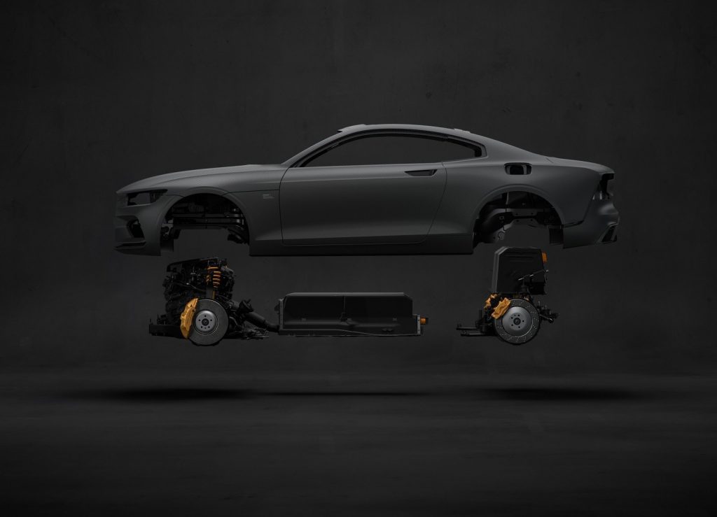 A 2020 Polestar 1 coupe body hovering over the car's hybrid powertrain