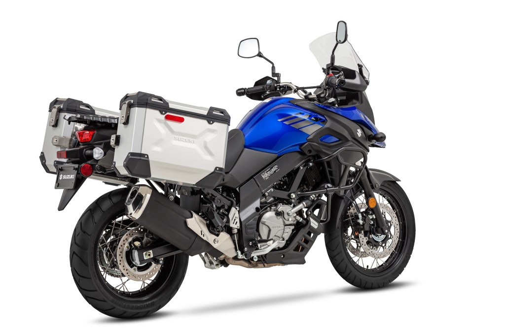 Rear-3/4 view of a blue-tanked 2020 Suzuki V-Strom 650XT Adventure with aluminum pannier bags