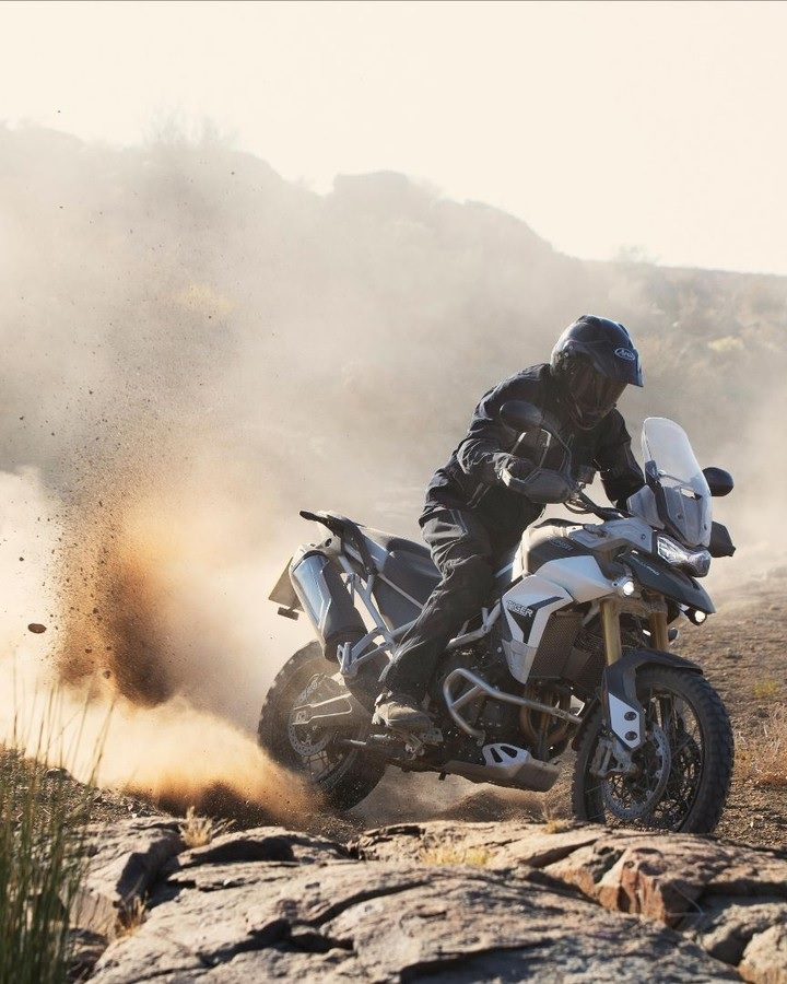 White-tanked 2020 Triumph Tiger 900 Rally skidding through the desert