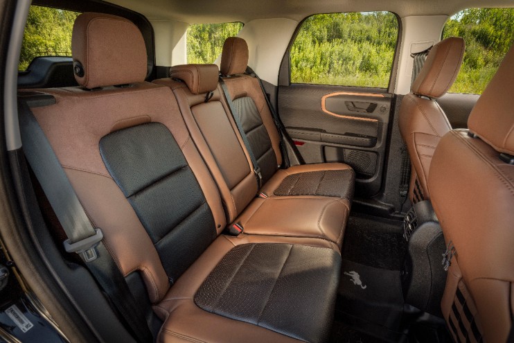 the rear seats of the 2021 Ford Bronco Sport in two tone brown leather