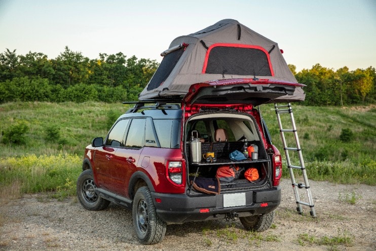 Bronco Sport with roof top camping, reading for a climbing trip.