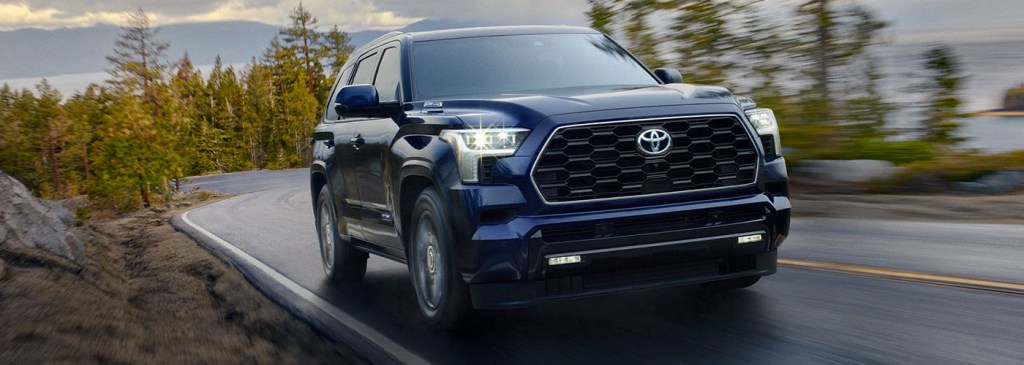 The 2023 Toyota Sequoia driving down the road