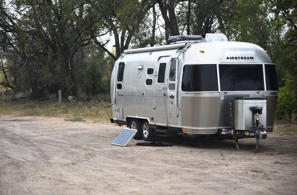 An Airstream travel trailer with a solar panel kit