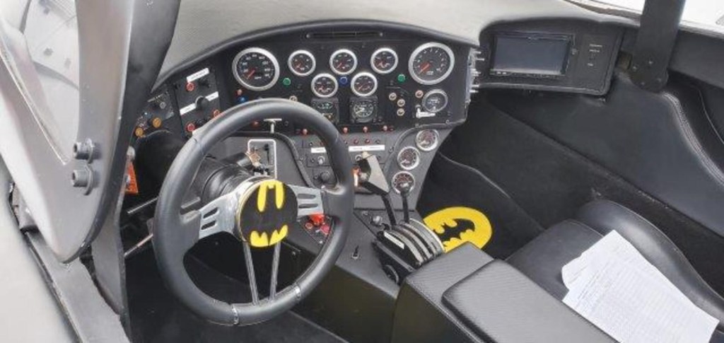 The interior of a Tim Burton Batmobile movie car replica.