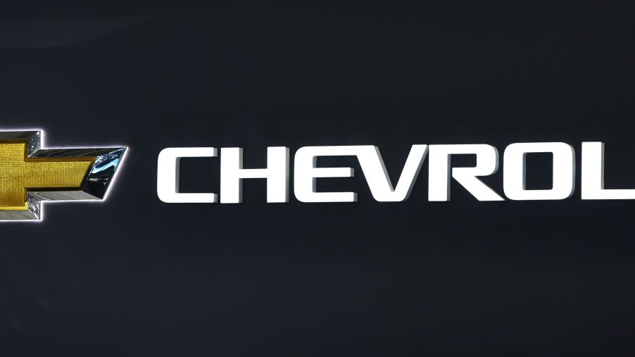 A gold Chevrolet bowtie logo and the Chevrolet script next to it.