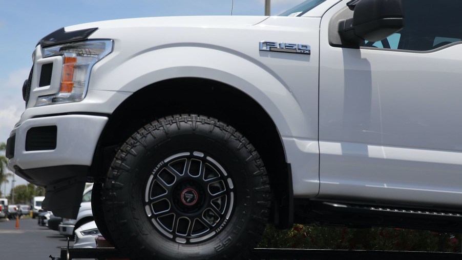 A Ford F-150 pickup truck – a competitor to the Chevy Silverado – is seen on a sales lot on May 10, 2018 in Miami, Florida.