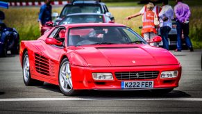 A red Ferrari Testarossa at the Top Gear test track.