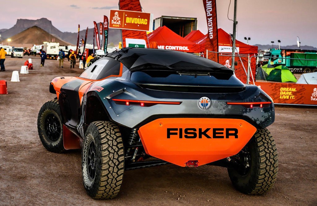 The rear of the Fisker Ocean electric SUV race truck. The rear orange skid plate says Fisker