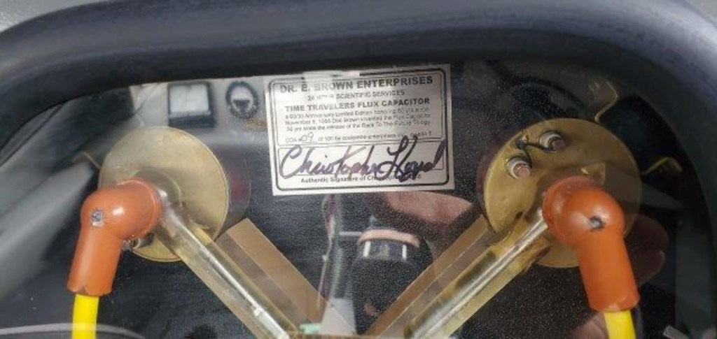 The Flux Capacitor on this Back to the Future Delorean replica is signed by Christopher Lloyd, the actor who portrayed Doc Brown in the movie.