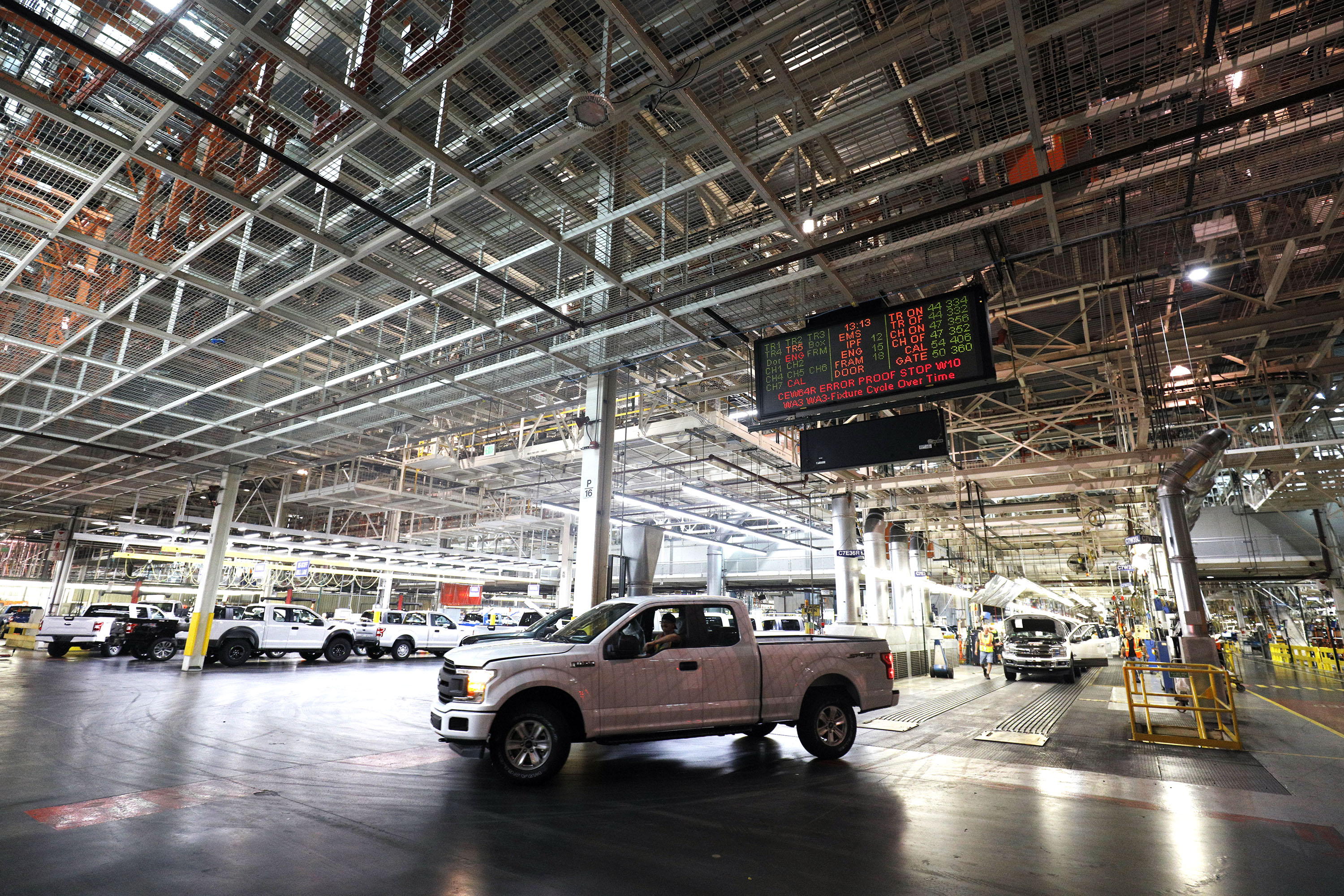 Ford F-150 trucks come off the assembly line at the Ford Dearborn Truck Plant