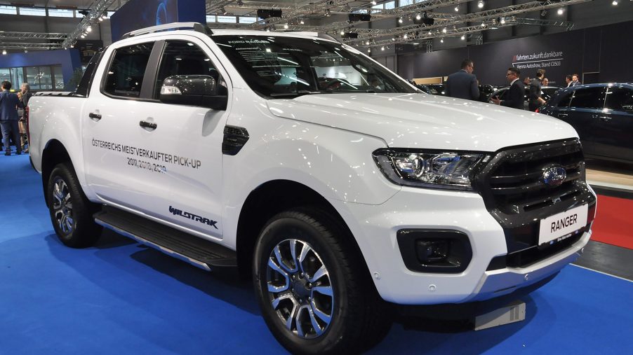 A white 2020 Ford Ranger on display at an auto show