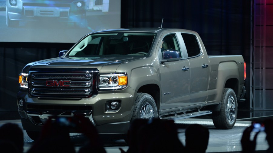 A GMC Canyon truck on display at an auto show