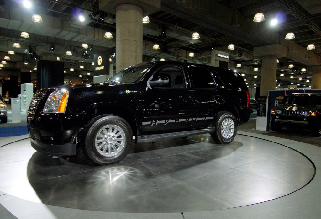 A GMC Yukon Hybrid on display at an auto show