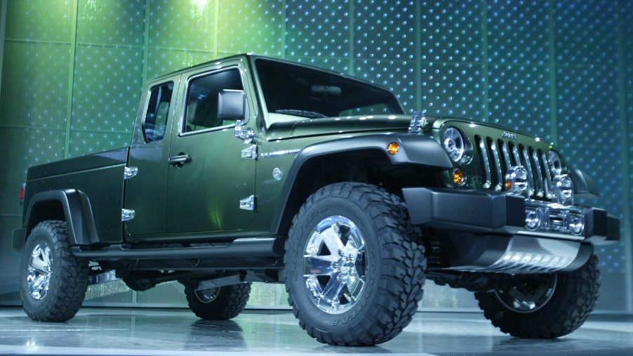 A green Jeep Gladiator concept truck on dispaly