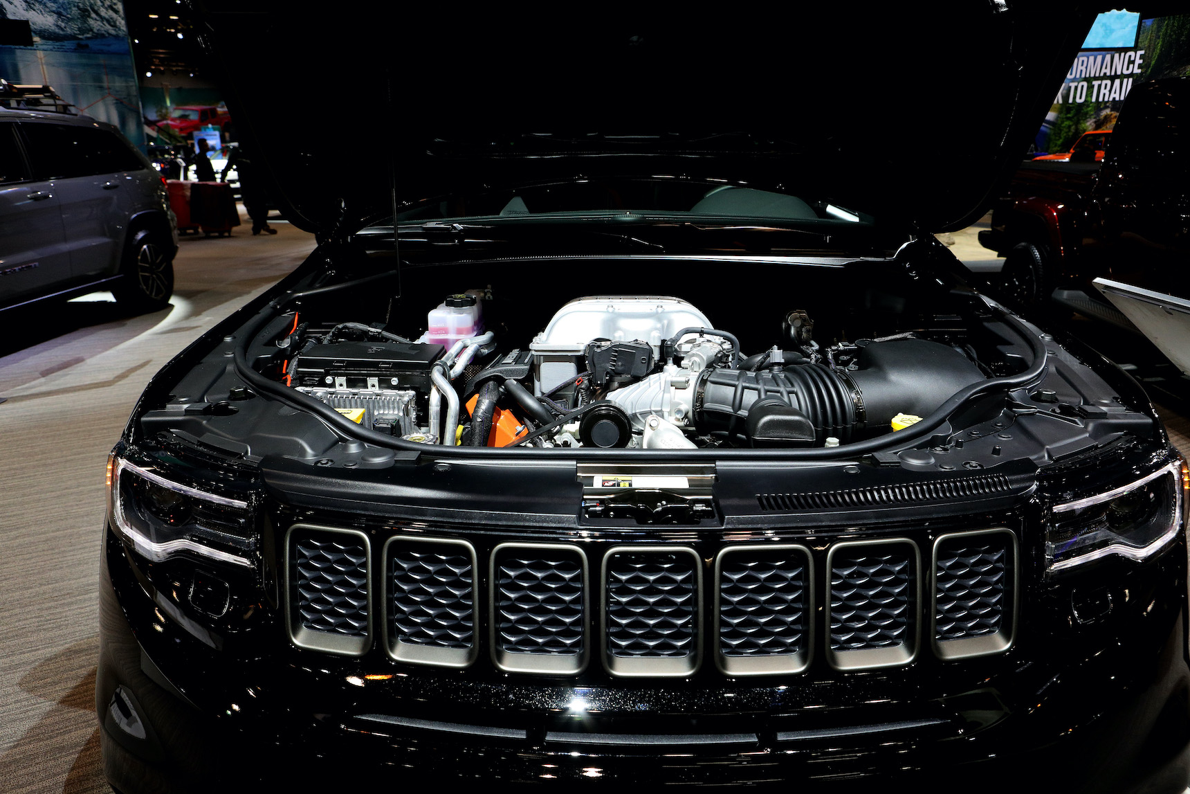Under the hood of a black 2020 Grand Cherokee Trackhawk on display at the 112th Annual Chicago Auto Show