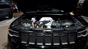 Under the hood of a black 2020 Grand Cherokee Trackhawk on display at the 112th Annual Chicago Auto Show