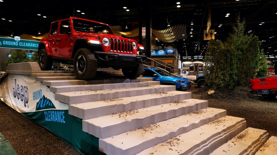 A 2020 Wrangler Rubicon makes its way through the 'Jeep Experience Ground Clearance' exhibition at the 112th Annual Chicago Auto Show