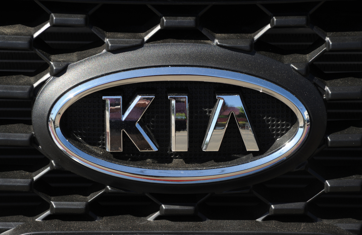 A Kia logo seen on the front grille of a car
