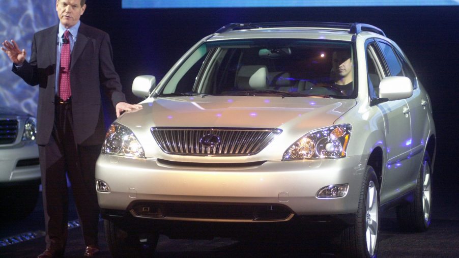 A Lexus RX SUV on display at an auto show