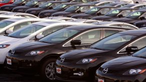 Cars on display at a Mazda dealership