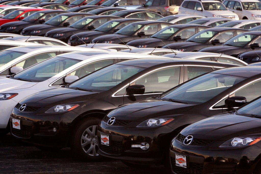 Cars on display at a Mazda dealership