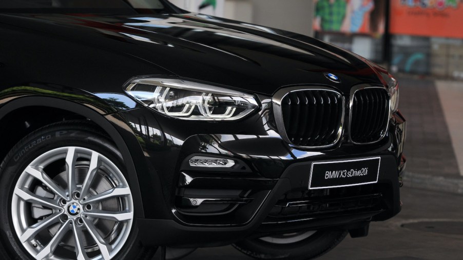 A look at a black BMW X3's front grille, a direct competitor to the Audi Q5