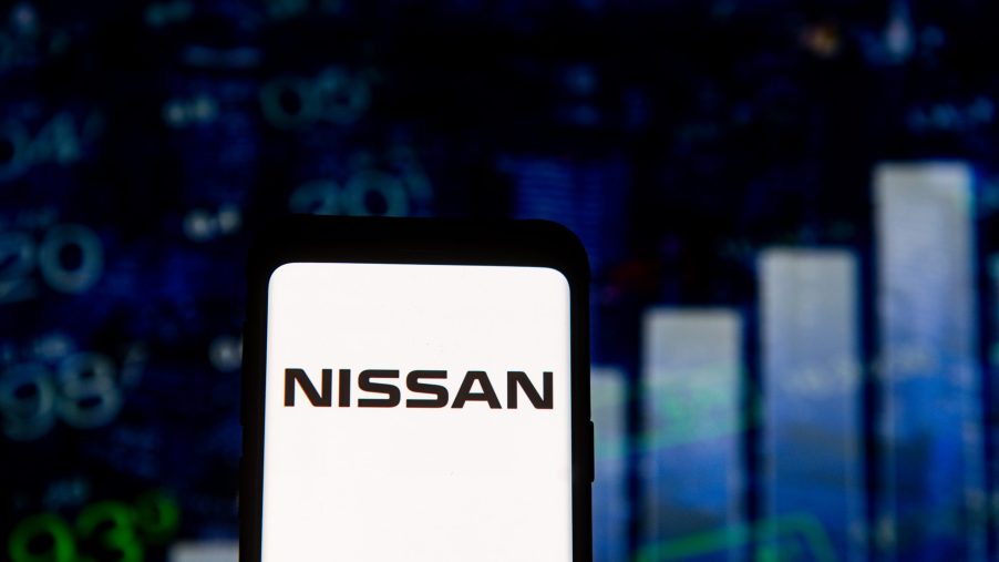 A Nissan logo displayed on a phone screen