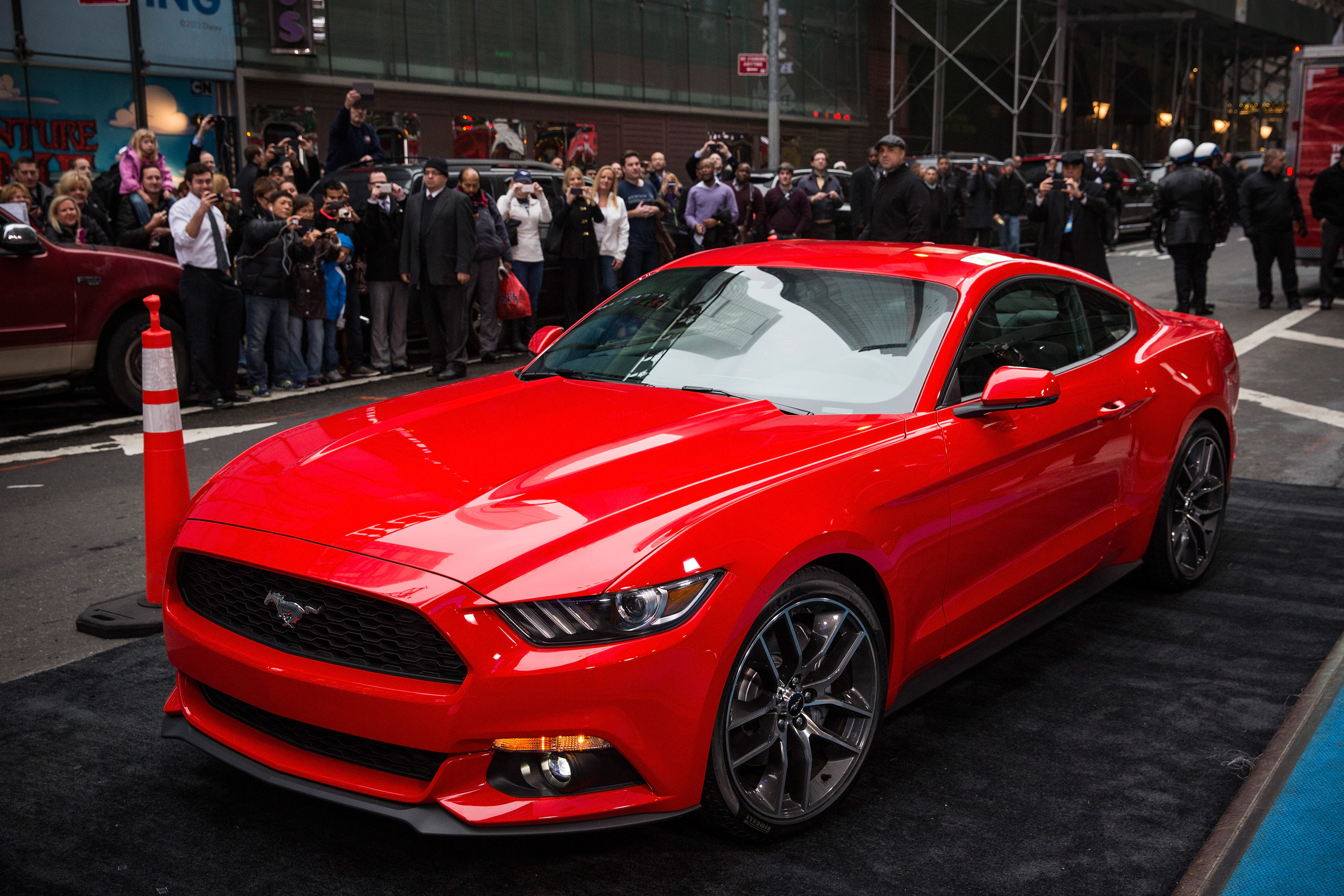 A red Ford Mustang on display