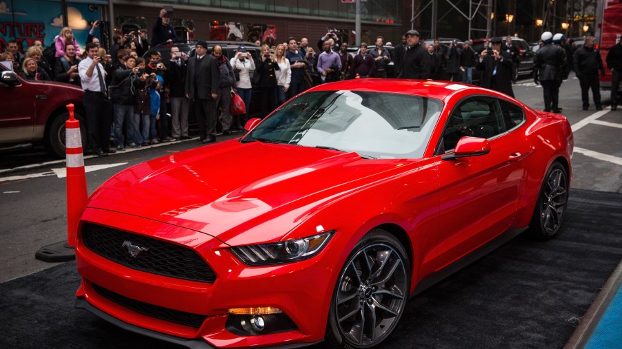 A red Ford Mustang on display