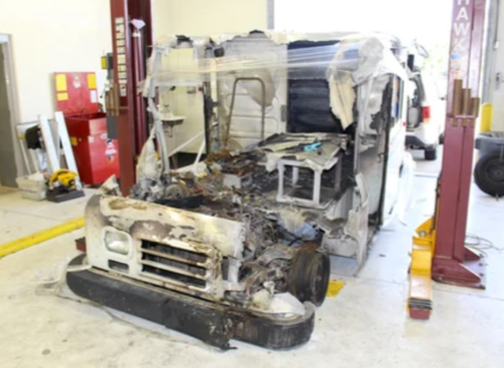 burned up usps mail truck