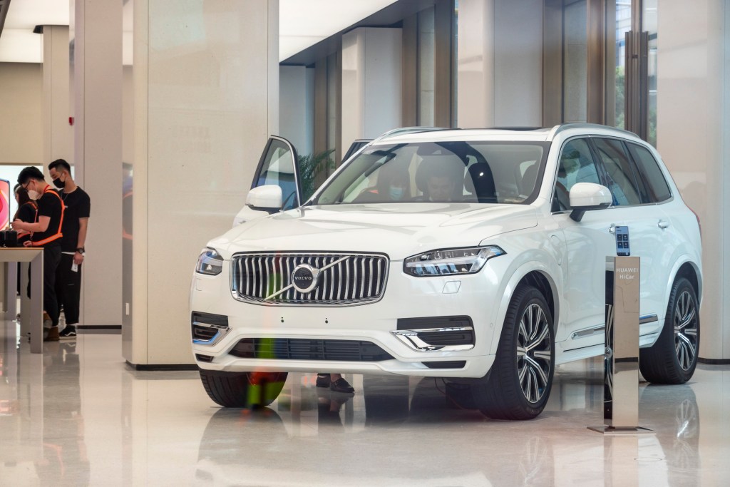A white 2020 XC90 is seen in a new Huawei Global Flagship Store