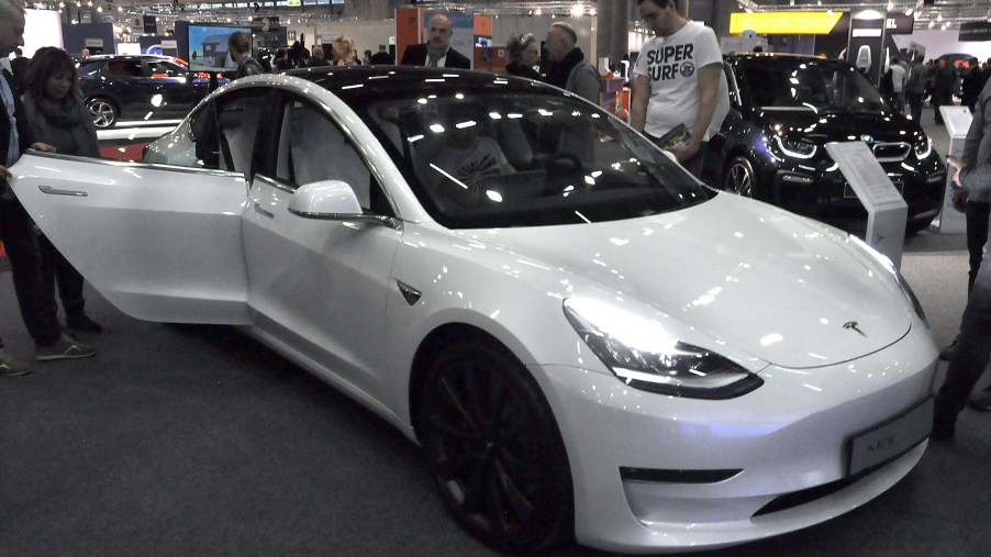 A white 2020 Model 3 is seen during the Vienna Car Show press preview at Messe Wien, as part of Vienna Holiday Fair
