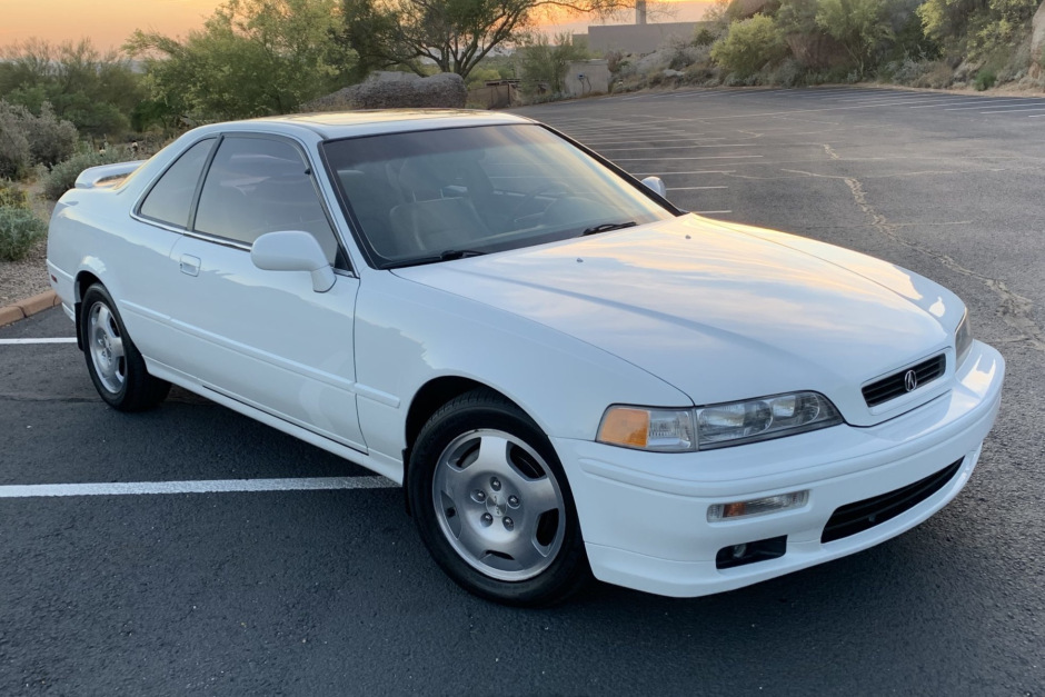 a white acura legend coupe front shot