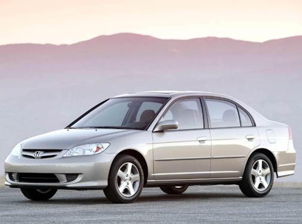 a 2004 model year Honda Civic with a mountainous backdrop