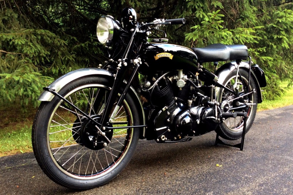 A 1953 Vincent Black Shadow Series C in front of some trees