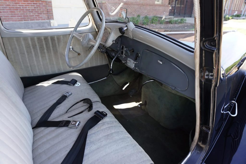 A 1957 Citroen Traction Avant's front seats and dashboard