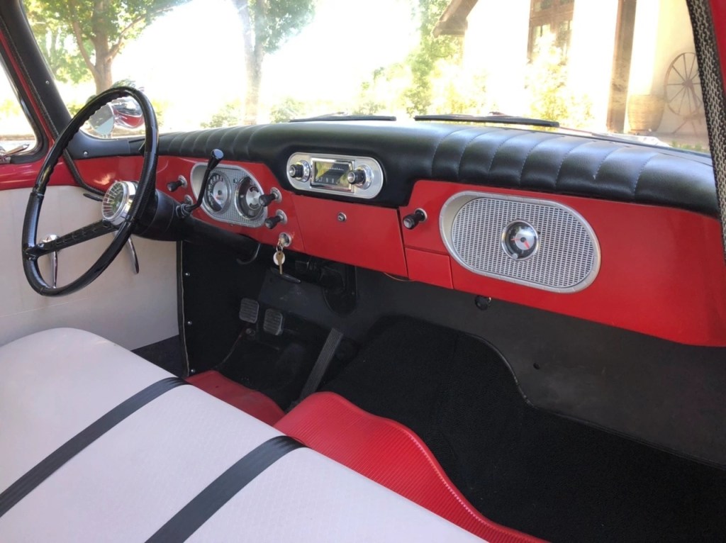 The red-and-white interior of a 1962 Studebaker Champ
