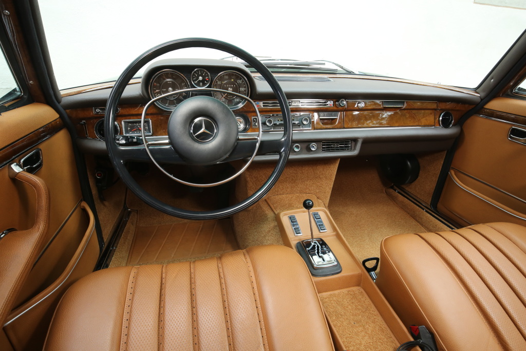 The tan-leather interior of the 1968 Mercedes 300SEL 6.3