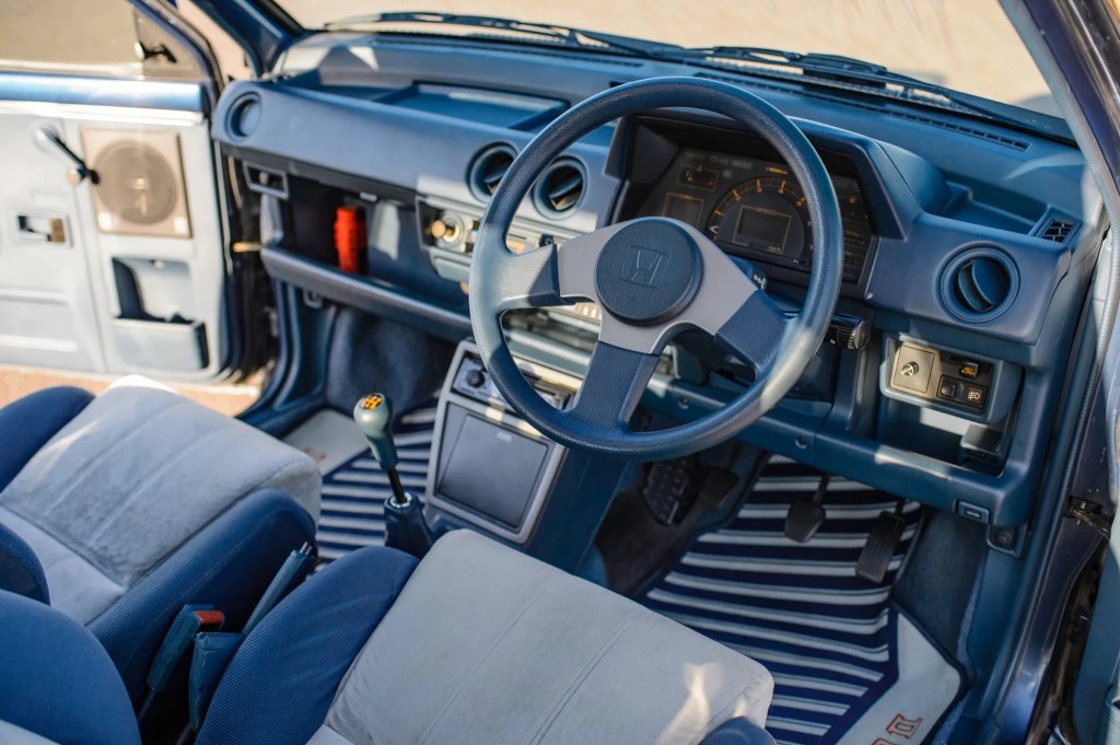 The front seats and dashboard of a 1983 Honda City Turbo II