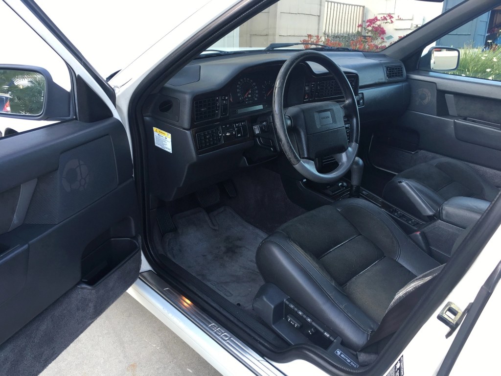 The black-leather-and-suede interior of a 1997 Volvo 850R Wagon